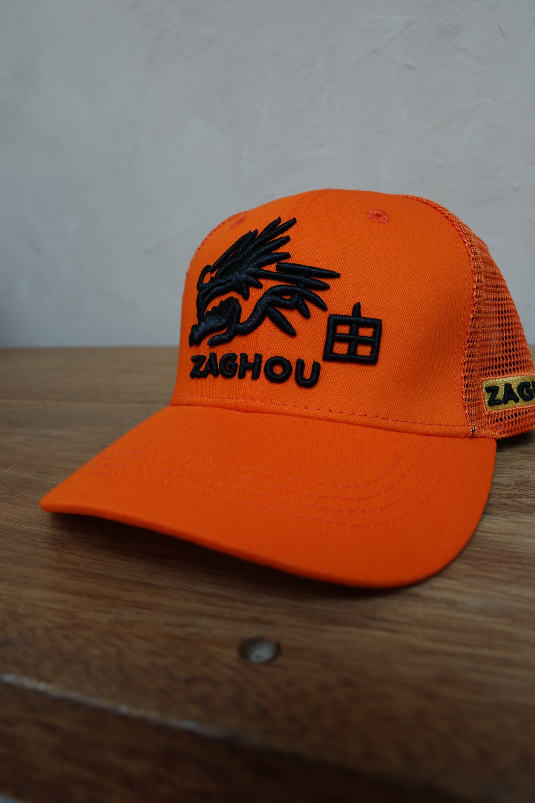 Premium Orange Cap with Black Branding – Stylish Adjustable Hat
